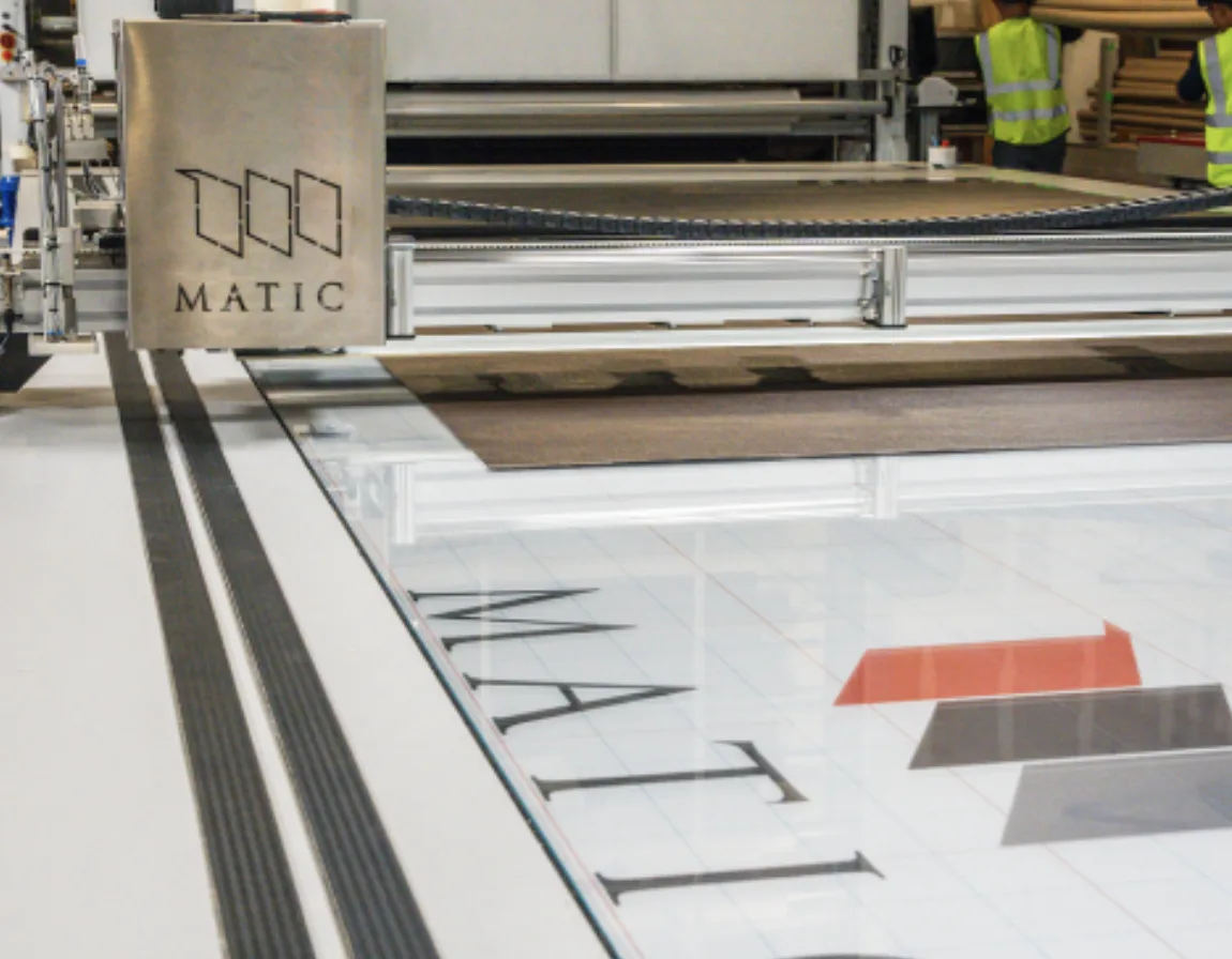 Automated fabric cutting machine on the factory floor